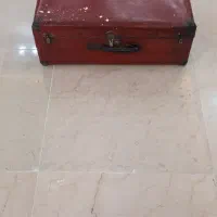 چمدان چوبی با روکش چرمی
