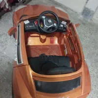 ماشین دو موتوره با باتری و شارژر نو