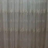 پرده تور کار شده