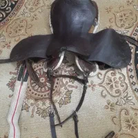 تعدادی زین و کلگی  چرم درجه یک دهنه