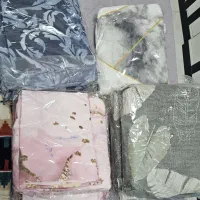 تعدادی کاور تشک یک نفره همراه با روبالشی