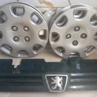 چهارتا قالپاق پژو ویک جلو پنجره تمیز قابل استفاده