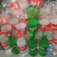 بطری نوشابه و در بطری