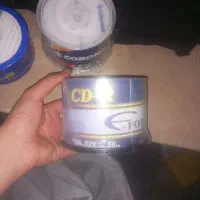 چهار بسته سی دی سه بسته دی وی دی