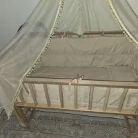 تخت گهواره کنارمادر مارک انجل لند