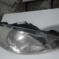 چراغ جلوی ۲۰۶ سمت راست  و محفظه فیلتر تیپ ۵