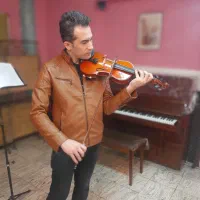 آموزش تدریس خصوصی ویولن گیتار هنگ درام سلفژ آواز