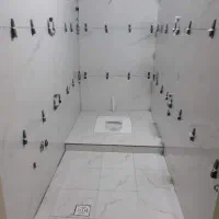 کارگر .شاگرد کاشی کاری