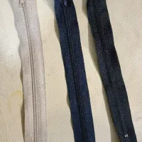 زیپ و دکمه لباس