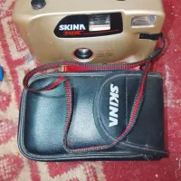 یک دستگاه دوربین عکاسی ژاپنی