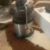 آبمیوه گیری کنو