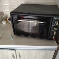 توستر اک
