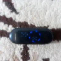 ساعت  لمسی قرمز با آرم توپ