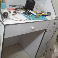 ویترین  میز تعمیر دکور شیشه ای