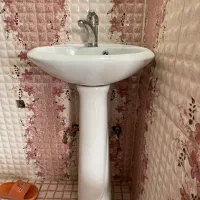 روشویی و شیر آب