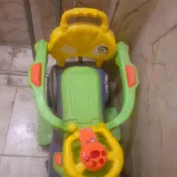 ماشین چهار چرخ دسته دار