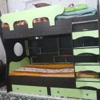 تخت دو طبقه با کمد
