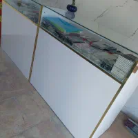 دکور مغازه ویترین میز شیشه ای فروشی