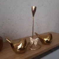 شمعدان ودوپرنده طلایی