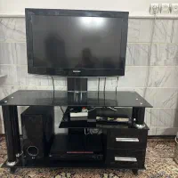 میز تلویزیون شیشه‌ای