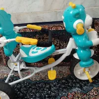 سه چرخه با دسته فرمانی و سایبان