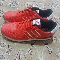 یک جفت کتونی قرمز نو43 تا 45