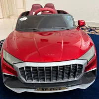 ماشین شارژی آئودی کودک دو نفره چهار موتوره