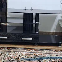 میز تلویزیون  شیشه ای در حد نو