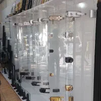 رگلاژ،تعمیرات وتعویض یراق الات دربهای شیشه ایی