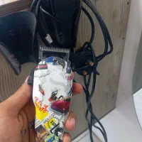 ماشین اصلاح و یک خط زن