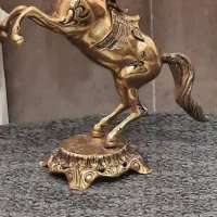 یک جفت ببر و یک عدد فیل برنجی