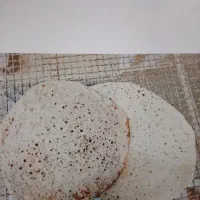فروشنده خانم در نانوایی سنتی