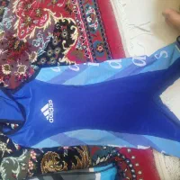 لباس و کفش کشتی بچگانه