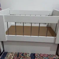 تخت گهواره ای نوزاد