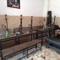 قلیان و میز و نیمکت لوازم کافه