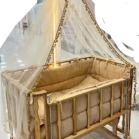 تخت گهواره ای نوزاد
