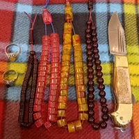 ۴عدد تسبیح.۱عدد چاقو دسته شاخ تیغه۸میل ۲تا انگشتر