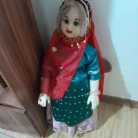 عروسک با لباس محلی