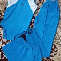 لباس ژیمناستیک و چوب بالانس