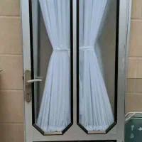 درب و پنجره آلومینیومی محافظ در