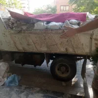 حمل نخاله باکامیون سبک وسنگین توسط کارگروبابکت