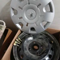 رینگ ۱۴فولادی  ۴عدد قالپاق و ۴عدد پیچ ومهره