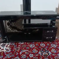 زیر تلویزیونی شیشه ای