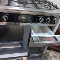 اجاق گاز خوشرنگ و شیک ک کشودار