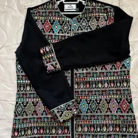 مانتو سوزن دوزی و یک عدد کت و شلوار زنانه