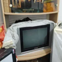 تلویزیون پانوسونیک با میز تلویزیون