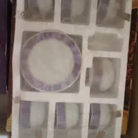 فنجان و نعلبکی به همراه قندان
