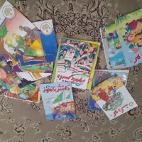 کتاب داستان و برگه اچار خط دار
