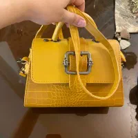 کیف دیوید جونزو صندل لژ چوبی