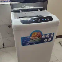 لباس‌شویی تمام اتوماتیک درب بالا پاکشوما ۷ کیلویی